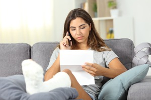 A woman calling a Social Security Disability Lawyer in Peoria IL