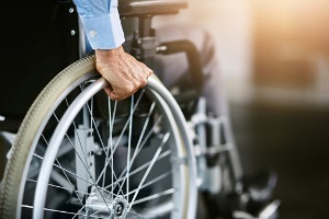 A man in a wheel chair needing the help of a Social Security Disability Attorney in Peoria IL
