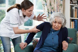 Nurse abusing an elderly lady, Nursing Home Abuse Lawyer needed in Bloomington IL